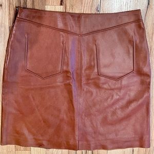 Anne Klein leather skirt , very cool pretend pockets on the back . Mint conditio